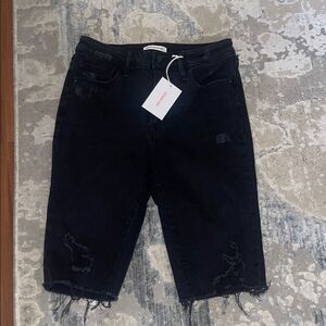 Good American Black Distressed Denim Shorts